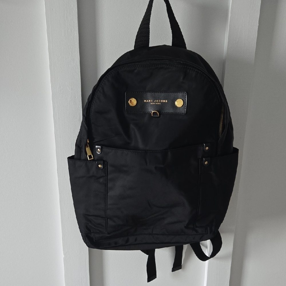 Marc Jacobs Black Backpack with Adjustable Straps and Structured Shape